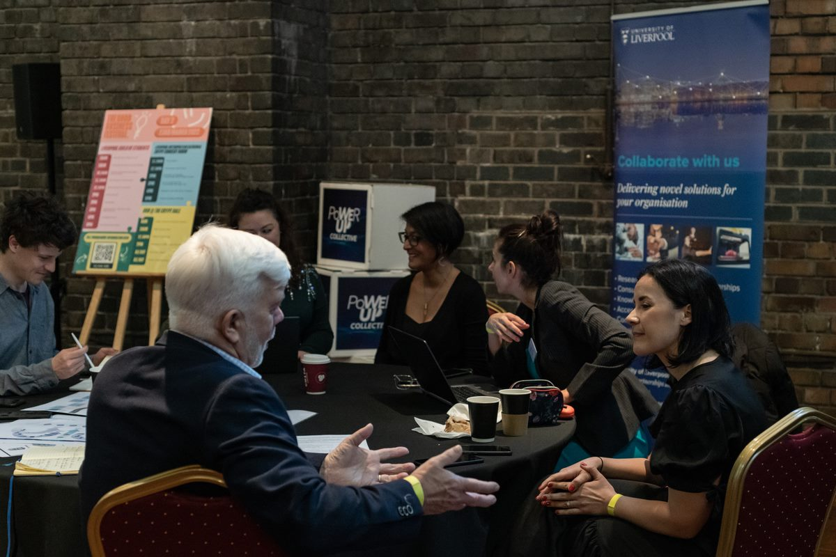 Figure 5 shows a consultant from the University's Low Carbon Eco-Innovatory giving one to one advice at a local business event.