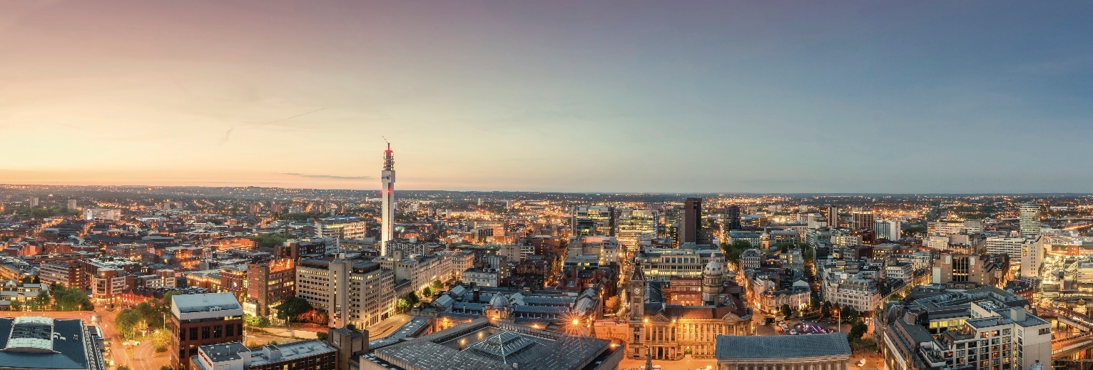 A picture depicting Birmingham's skyline at dusk.
