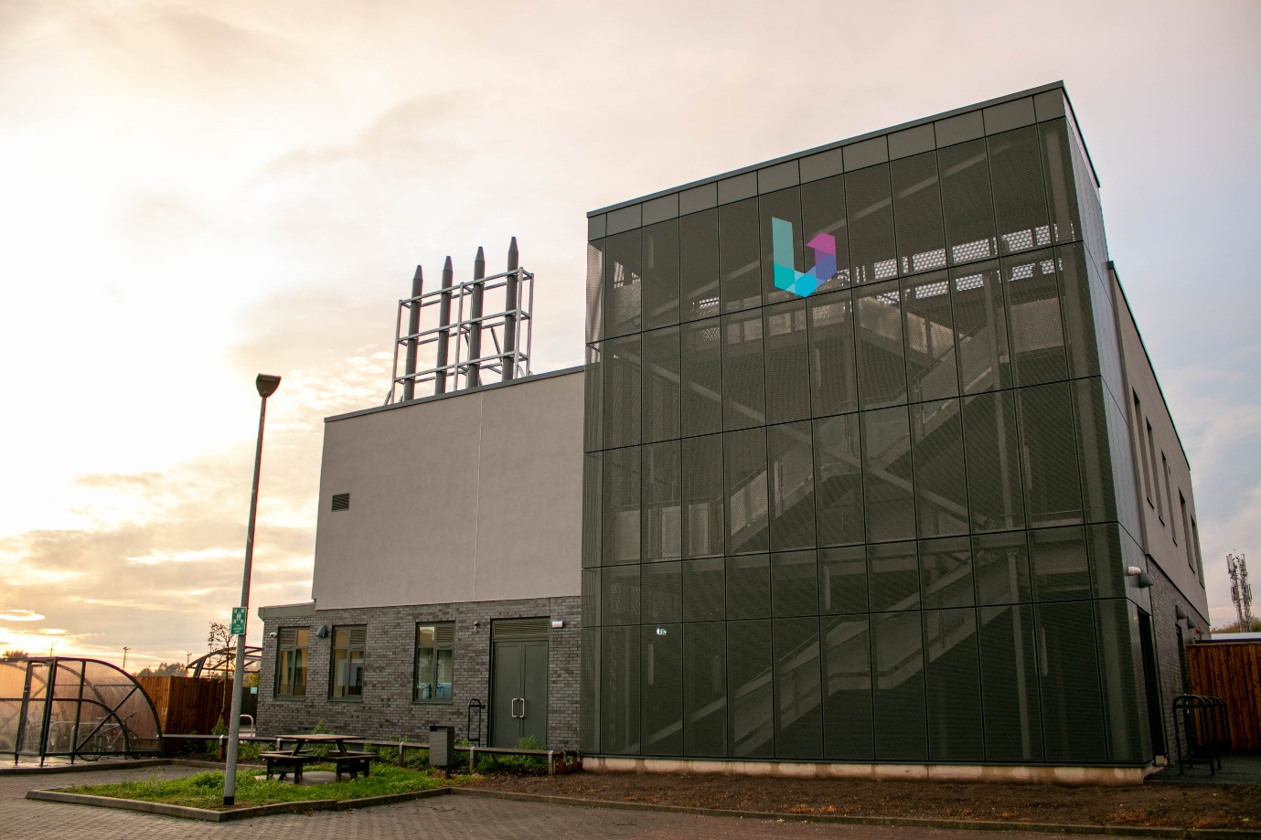 A picture of the Bridge Advanced Engineering Research and Development Centre, against and evening sky.