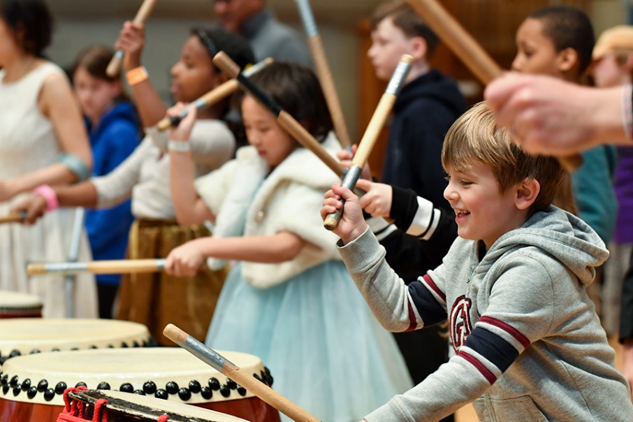 Children taiko drumming during a Festival of Percussion session run by Sparks, our learning and participation team