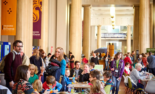 Image shows the Parkinson Court at the University of Leeds full of families enjoying the wide range of activities provided as part of the BeCurious annual event.