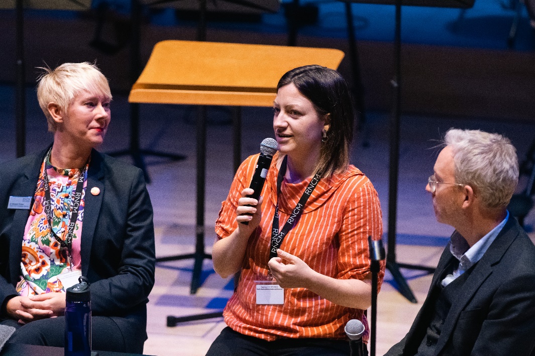 Three RNCM staff members speaking at a public RNCM open day about the RNCM content relating to entrepreneurship.
